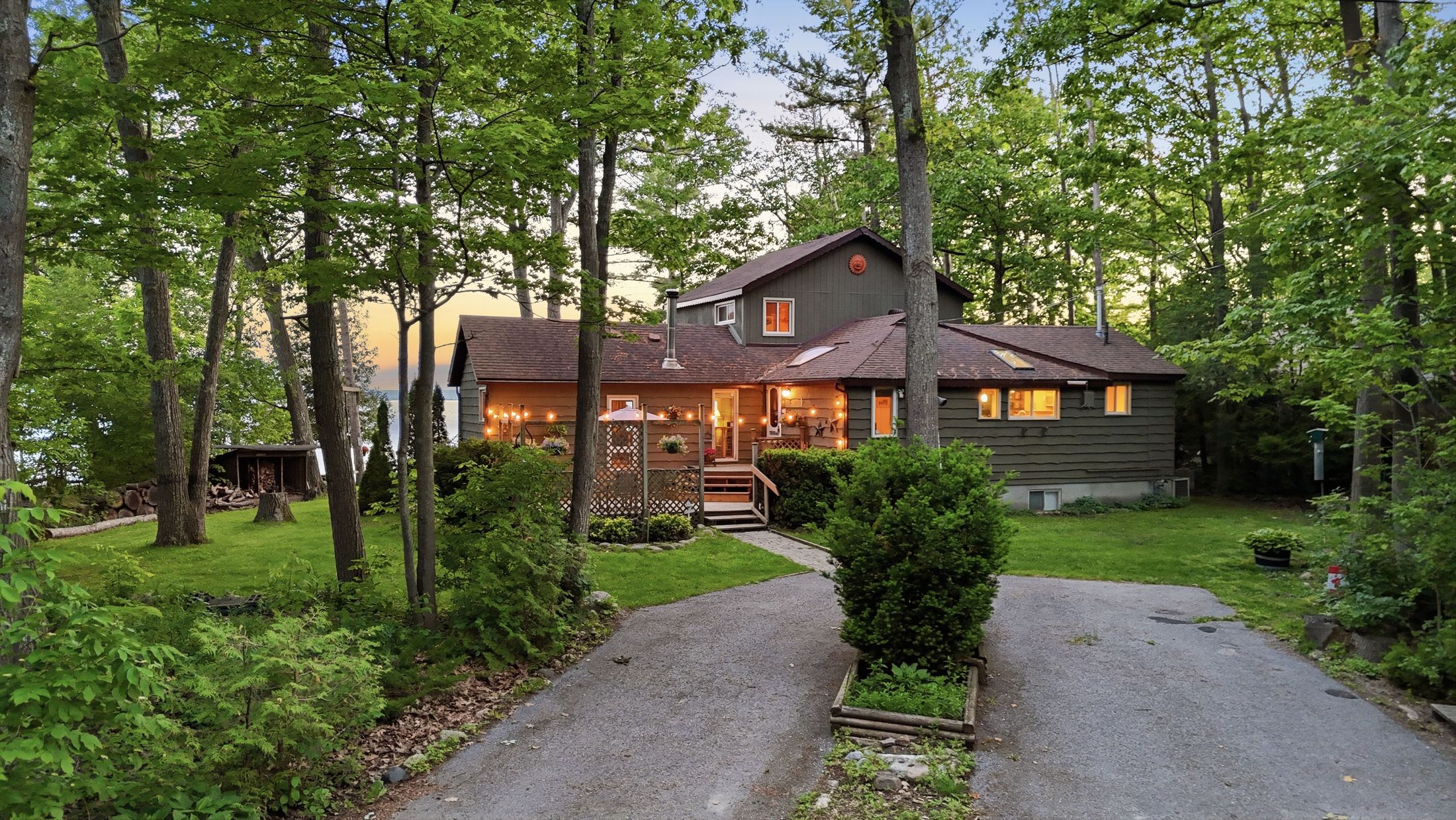 Aerial photo of a waterfront home in the trees